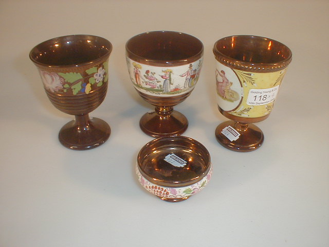 Appraisal: Three Victorian copper lustre goblets one printed with images after