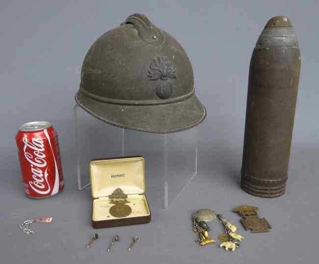 Appraisal: Military lot including early metal helmet morter and various medals