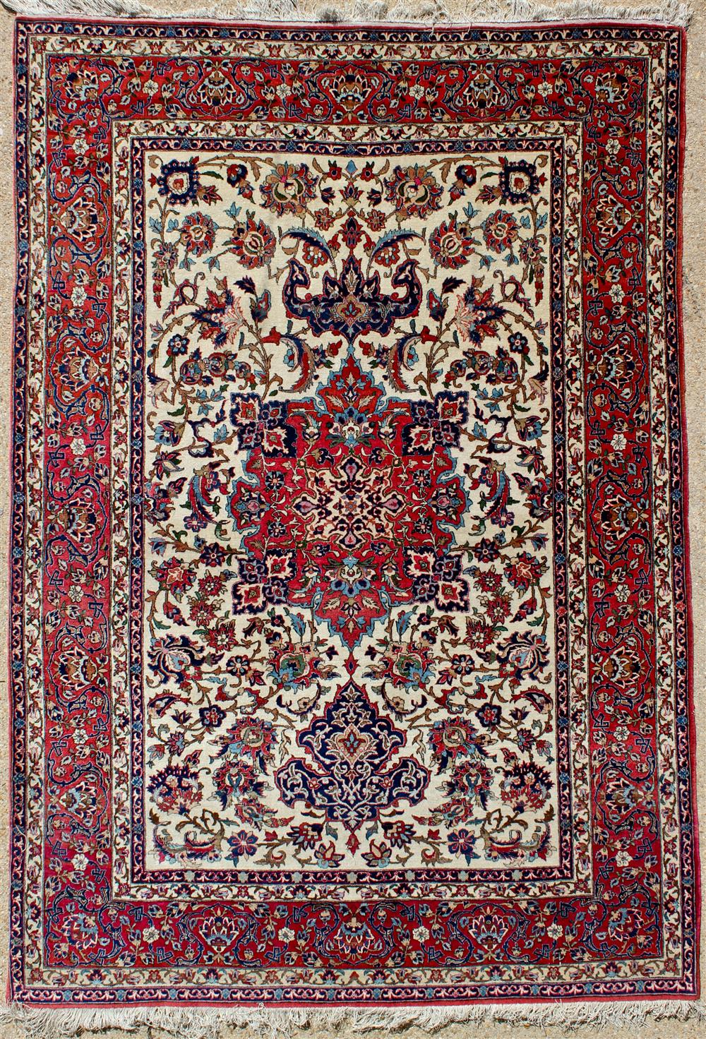 Appraisal: ISFAHAN MEDALLION RUG with a central medallion and floral pattern