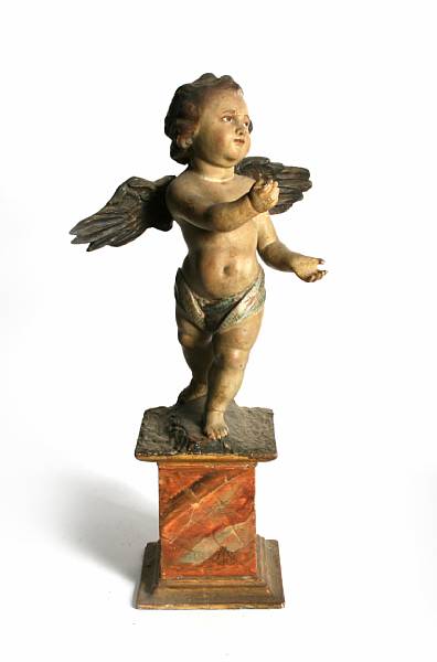 Appraisal: An Italian Baroque carved and painted angel height in