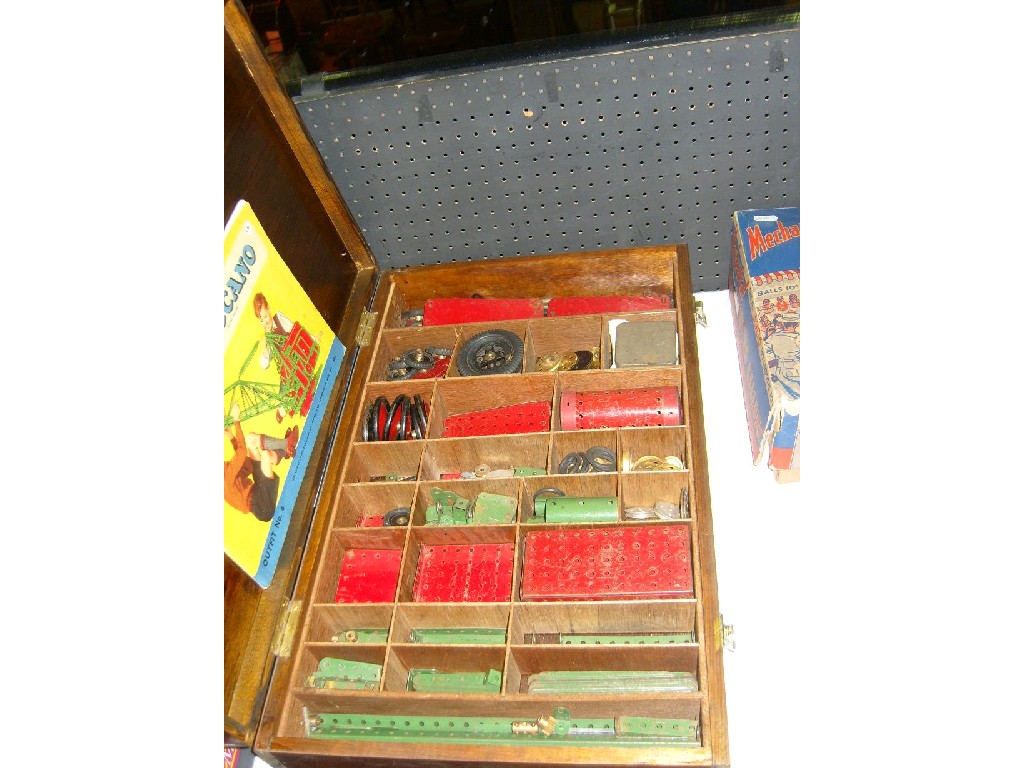 Appraisal: A wooden box containing a quantity of Meccano together with