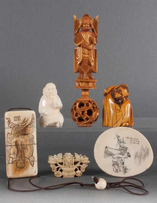 Appraisal: Six Japanese carved ivory and bone figures and objects including