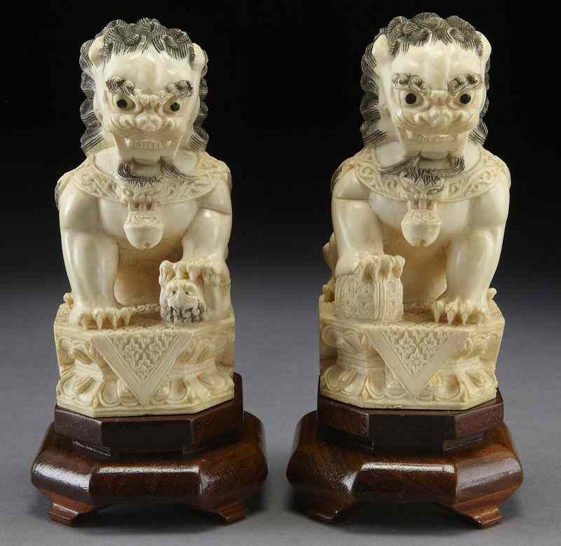 Appraisal: Pr Chinese carved ivory foo lions International buyers should note