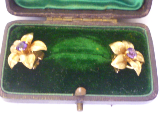 Appraisal: A PAIR OF AMETHYST EAR CLIPS modelled as ct gold