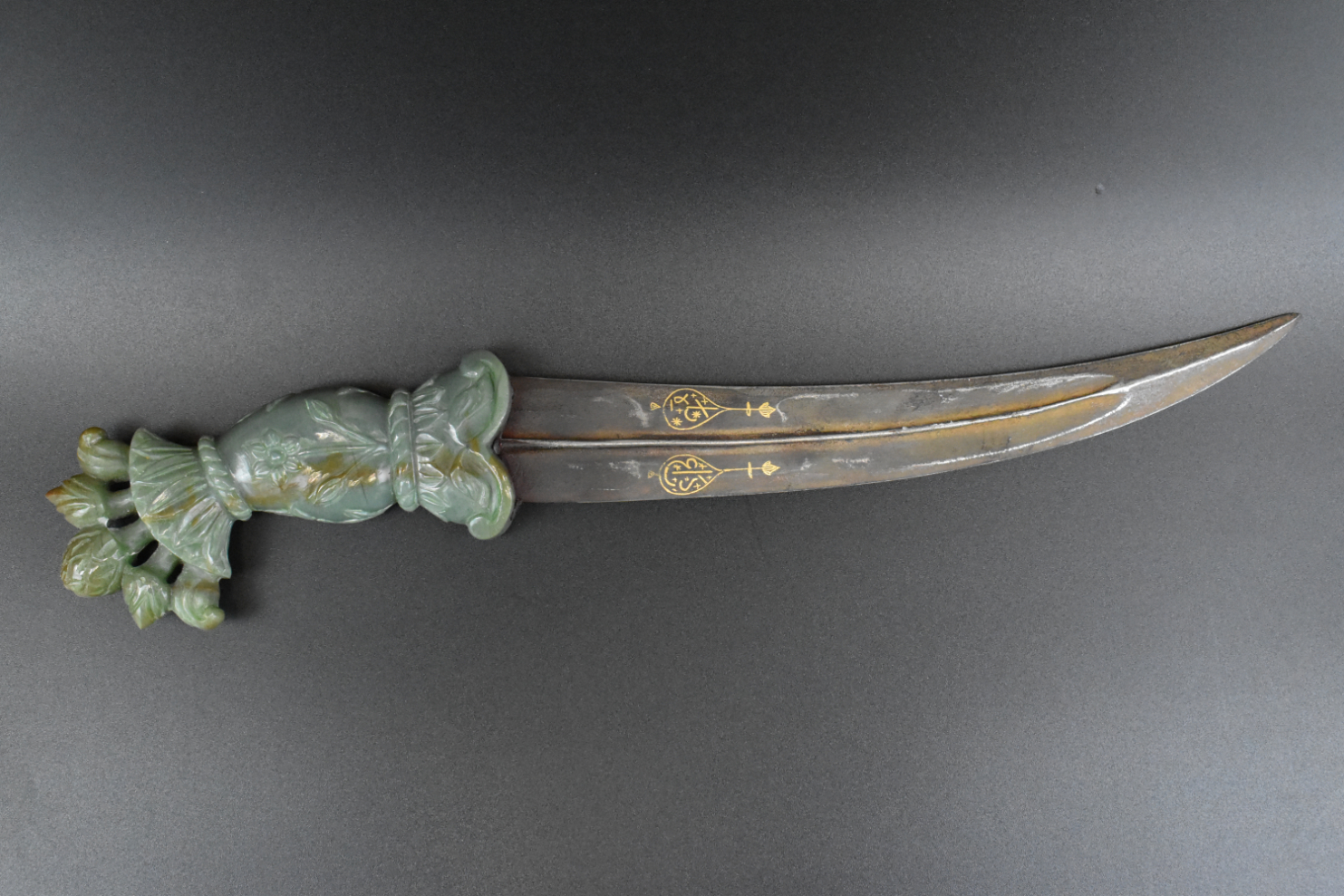 Appraisal: A Mughal dagger with spinach jade handle dating from the