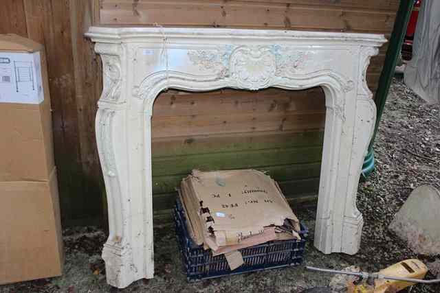 Appraisal: A FAUX MARBLE TH CENTURY FRENCH STYLE FIRE SURROUND wide