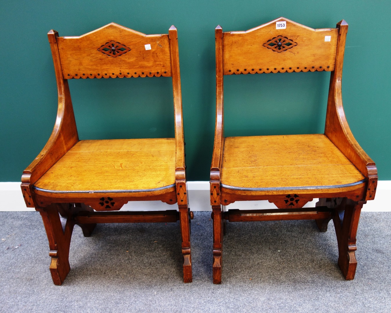 Appraisal: A pair of Victorian oak Arts and Crafts Gothic Revival