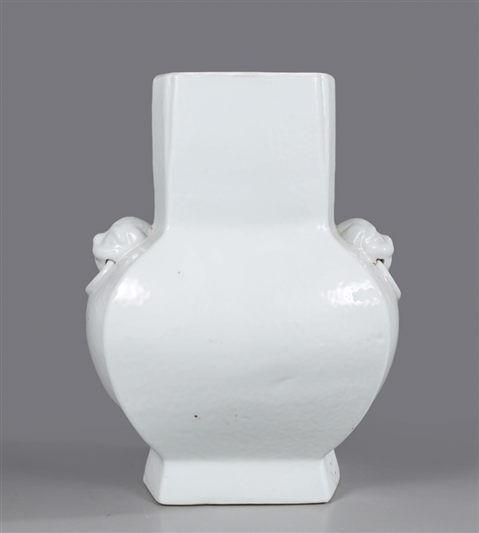 Appraisal: Chinese Blanc De Chine porcelain vase with molded foo dog