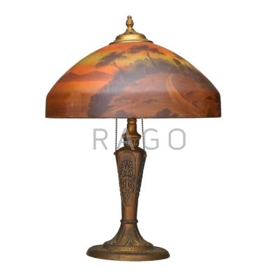 Appraisal: PITTSBURGH Table lamp USA s Patinated metal base and reverse-painted