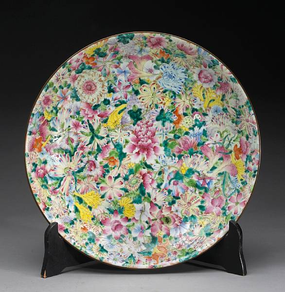 Appraisal: A large mille fleurs decorated porcelain charger Qianlong Mark Its