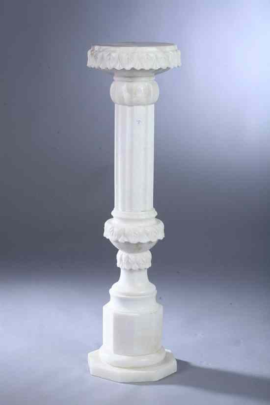 Appraisal: CONTINENTAL CARVED ALABASTER PEDESTAL Round top upon fluted pedestal hexagon