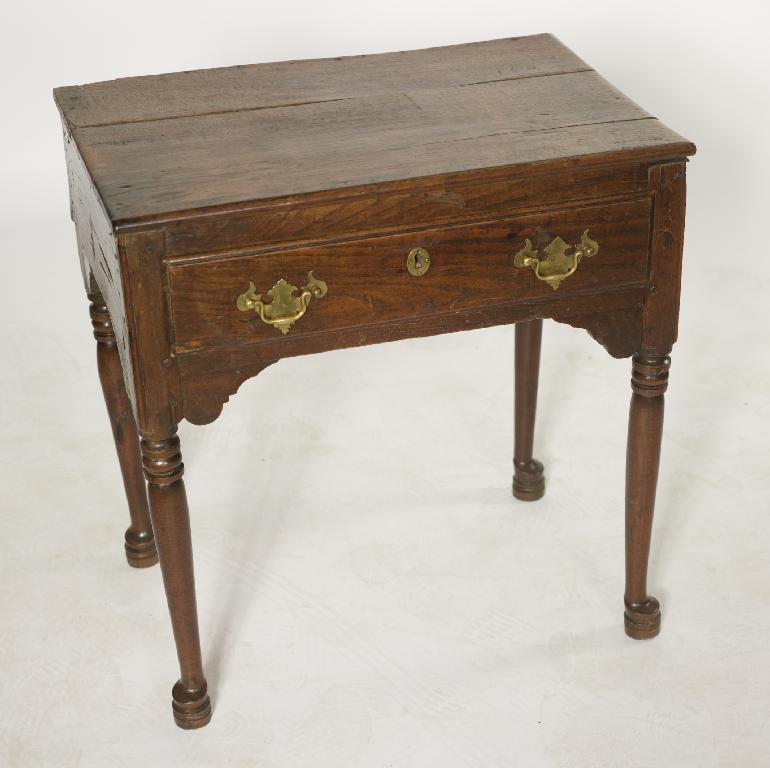 Appraisal: SMALL GEORGE III OAK LOWBOY the rectangular top above a