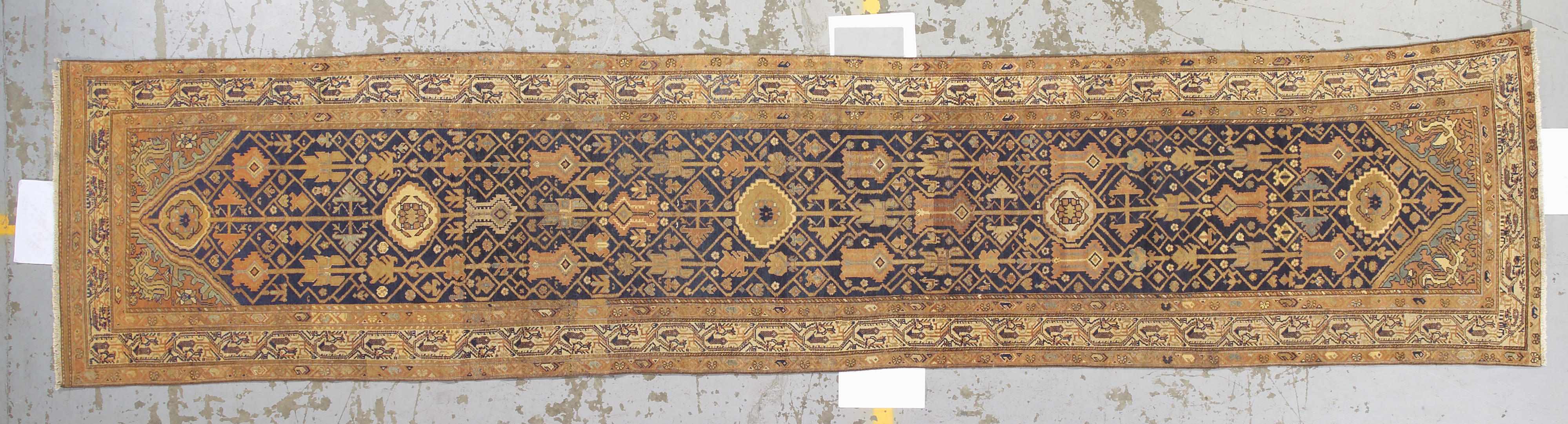 Appraisal: A Northwest Persian runner circa size approximately ft in x