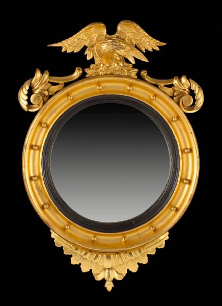 Appraisal: A Regency giltwood convex mirror first quarter th century The