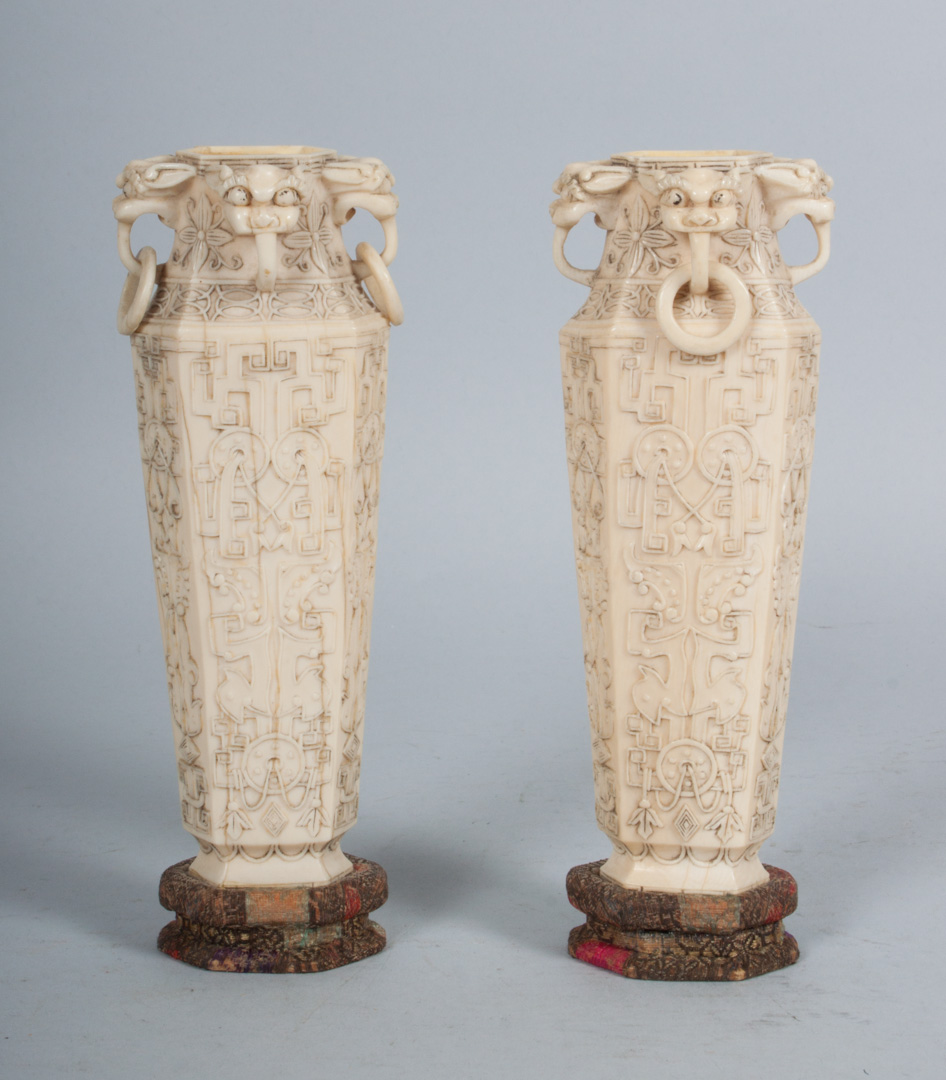 Appraisal: Pair of Chinese carved ivory vases hexagonal form with raised