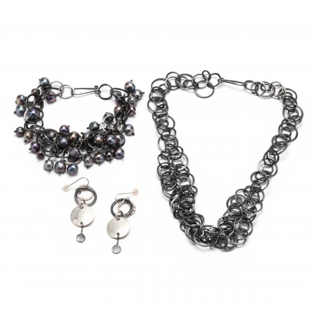 Appraisal: THREE PIECES OF BLACKENED SILVER MODERNIST JEWELRY To include a