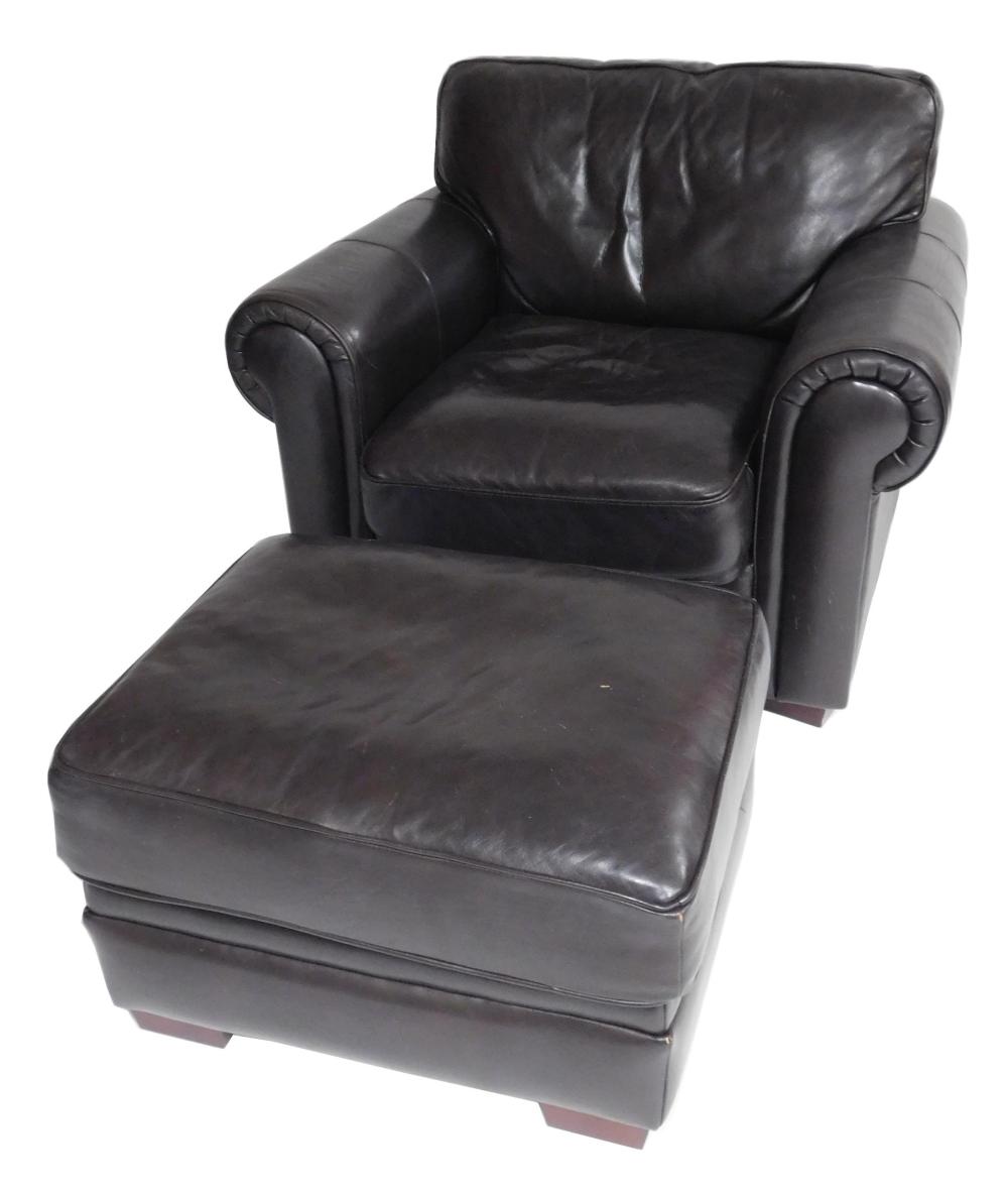 Appraisal: Brown leather chair and ottoman by Encore Home Design fixed