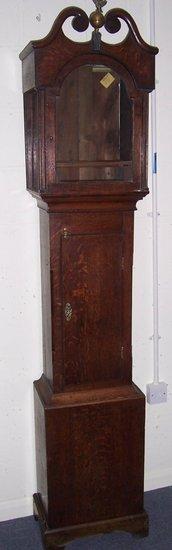 Appraisal: An oak long case clock case with swan neck hood