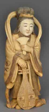 Appraisal: Japanese Carved Ivory Okimono MusicianProbably Meji period finely carved to