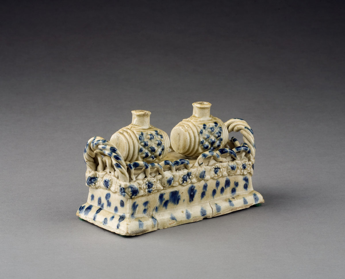 Appraisal: CONTINENTAL EARTHENWARE SLIP-DECORATED INKWELL EIGHTEENTH CENTURY The white earthenware body