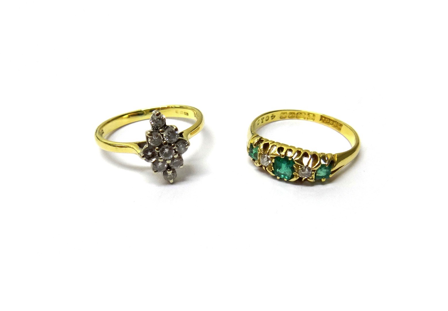 Appraisal: An ct gold emerald and diamond set five stone ring