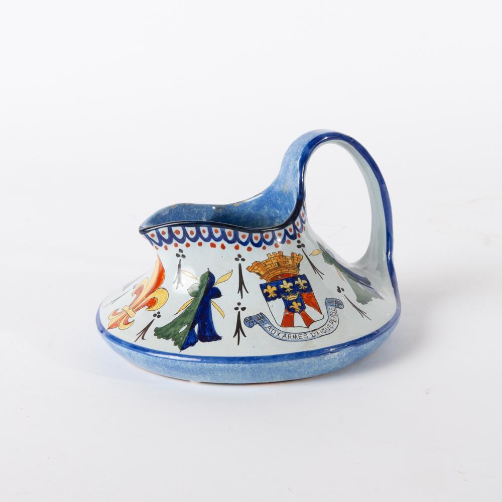 Appraisal: FRENCH FAIENCE PITCHER ADVERTISING CANDIED FRUITS A French faience squat