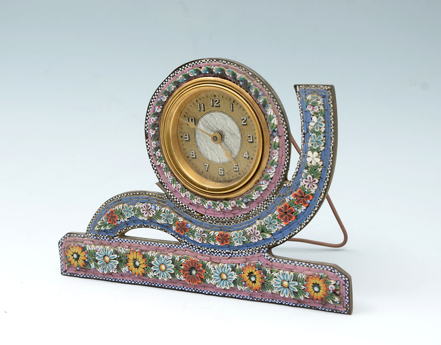 Appraisal: ITALIAN MICRO-MOSAIC CLOCK Italian micro mosaic frame having a floral