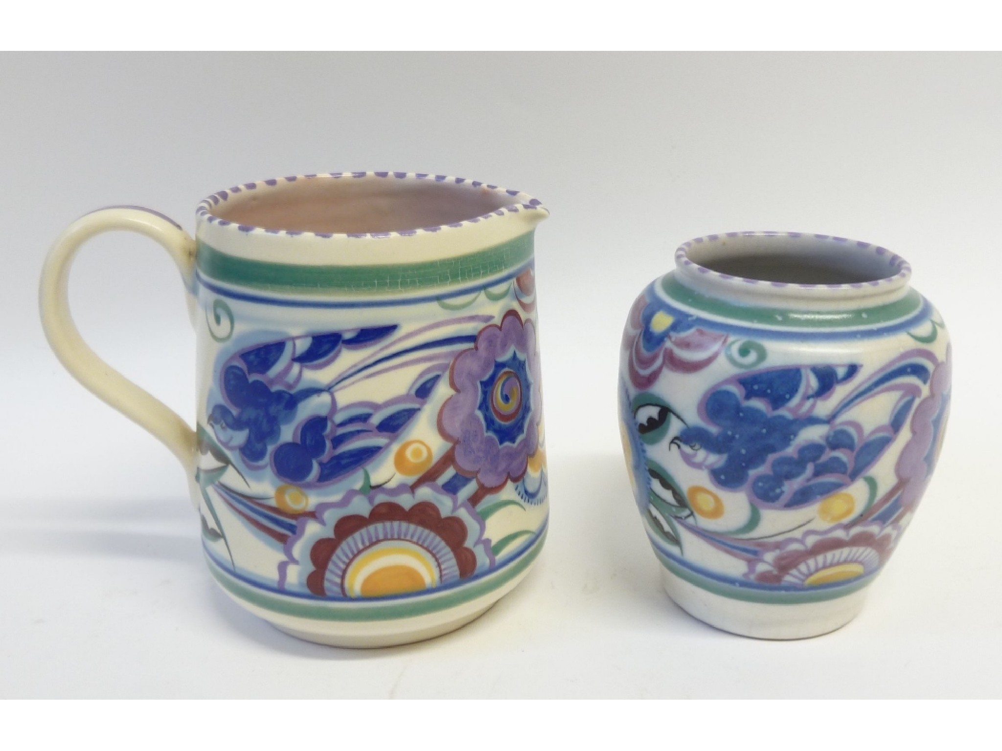 Appraisal: TWO MATCHING PIECES OF POOLE POTTERY floral painted in colours