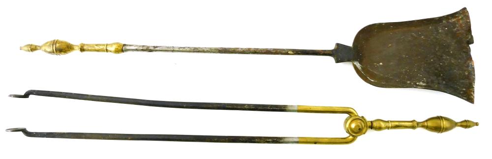 Appraisal: Pair brass handled fire tools c double lemon top design