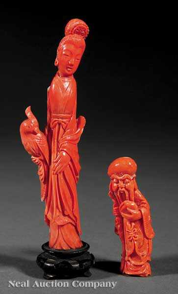 Appraisal: Two Chinese Coral Figures the first carved as Shoulao holding