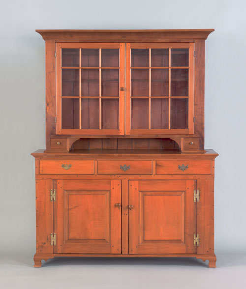 Appraisal: Pennsylvania walnut two part Dutch cupboard late th c h