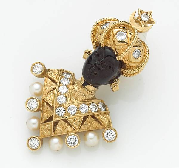 Appraisal: An ebony cultured pearl and diamond blackamoor enhancer Nardi carved