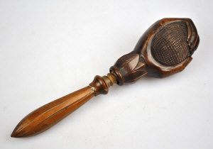 Appraisal: A th century fruitwood nut cracker carved as a hand