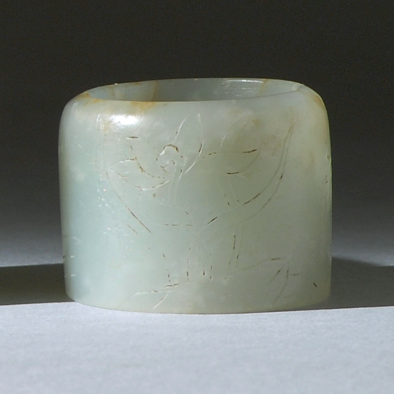 Appraisal: WHITE JADE SCHOLAR'S RING th CenturyIn cylinder form with engraved