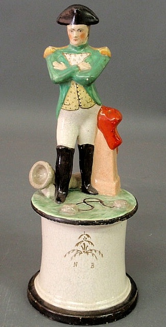 Appraisal: Staffordshire figure of Napoleon standing on a round plinth base