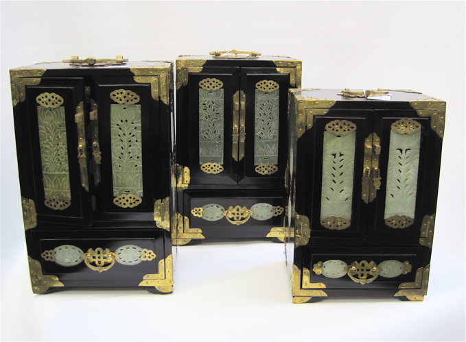 Appraisal: THREE CHINESE HARDWOOD JEWELRY CHESTS with jade panel decorations on