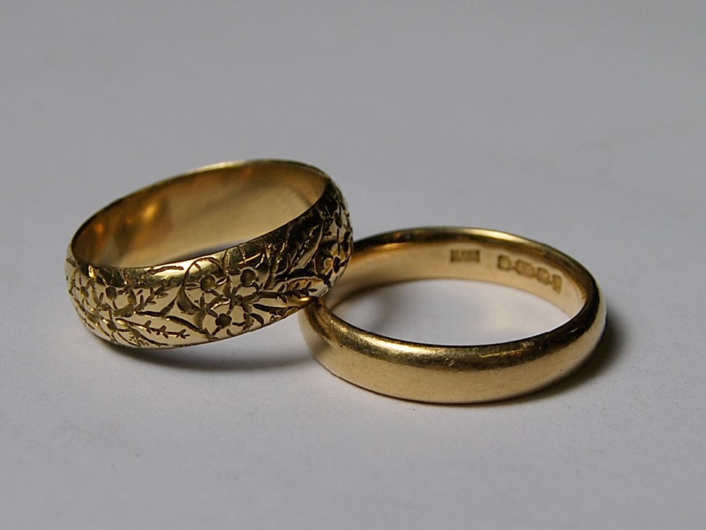 Appraisal: An ct gold plain wedding band and an ct gold