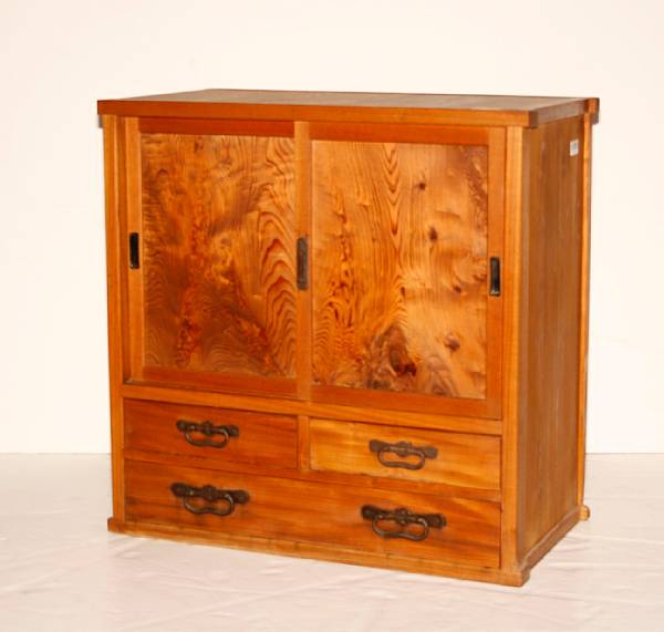 Appraisal: A Japanese wood tansu With a two sliding-door compartment above