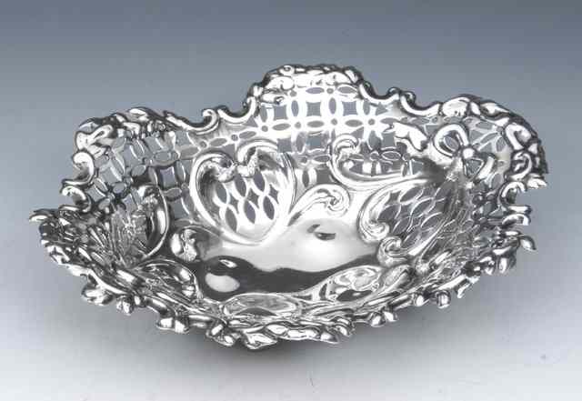 Appraisal: A LATE VICTORIAN SILVER SWEET MEAT DISH with pressed and