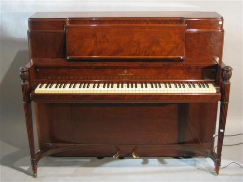 Appraisal: STEINWAY WALNUT UPRIGHT PIANO Circa - labeled Steinway and Sons