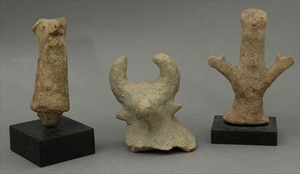 Appraisal: Two Terracotta Bull Head Fragments together with Two other Figures