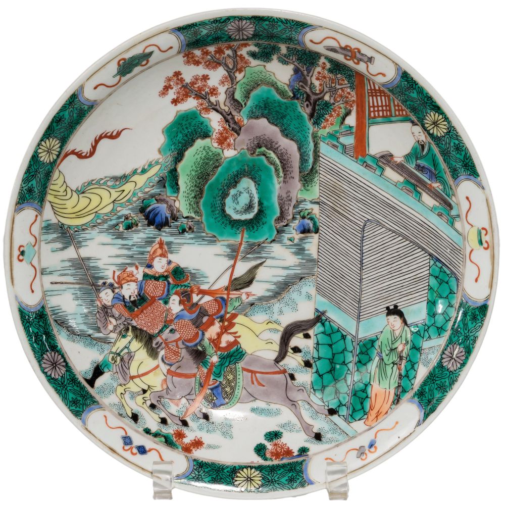 Appraisal: CHINESE FAMILLE VERTE PORCELAIN CHARGERDepicting mounted warriors and having an