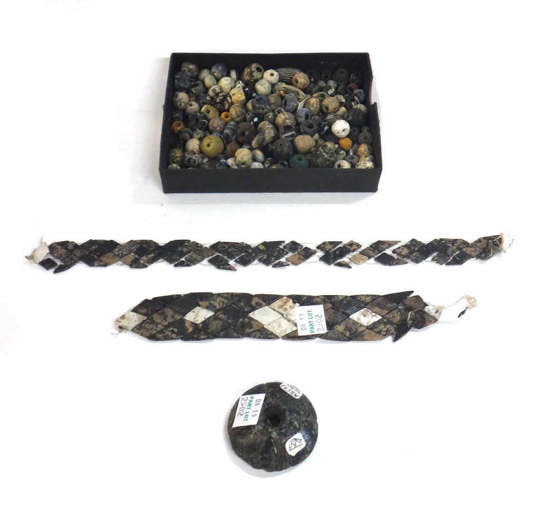 Appraisal: A group of glass beads and two glass armbands various