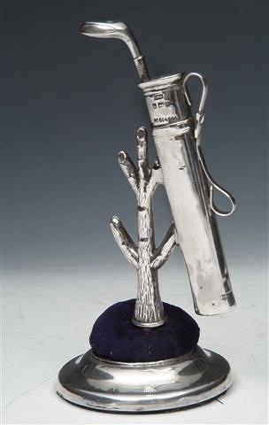 Appraisal: AN EDWARDIAN SILVER PIN CUSHION in the form of a