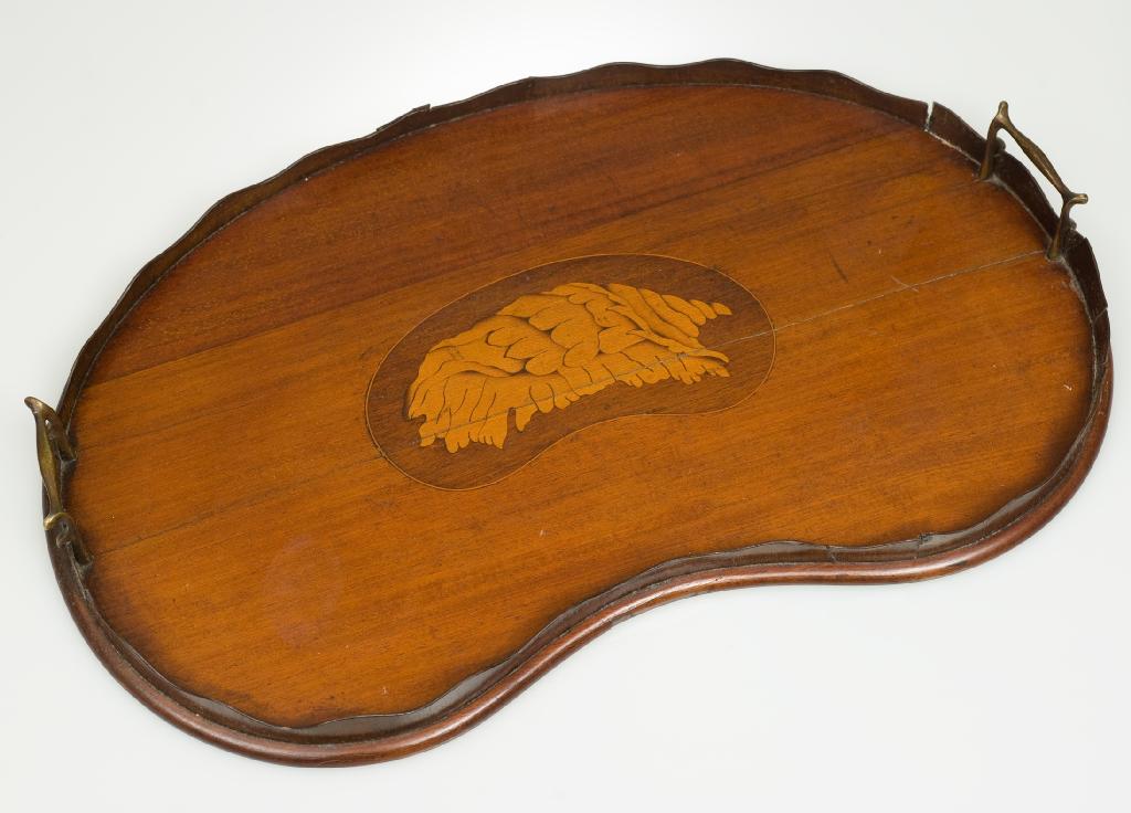 Appraisal: EDWARDIAN INLAID MAHOGANY GALLERIED RENIFORM TRAY fitted with twin carrying