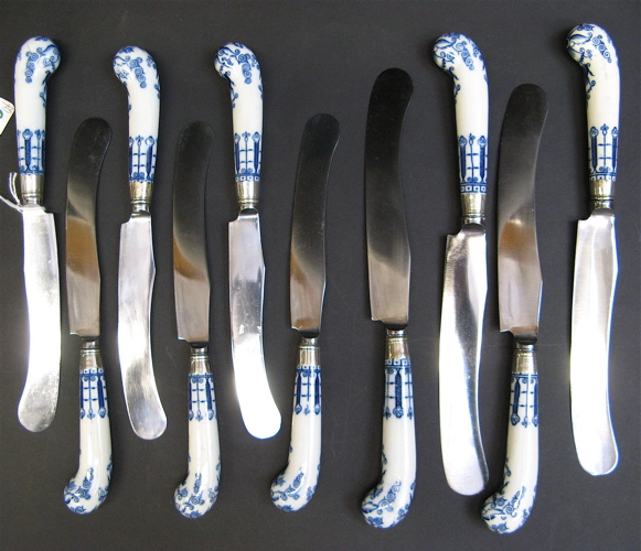 Appraisal: BLUE AND WHITE PORCELAIN HANDLED TABLE KNIVES having nickel silver