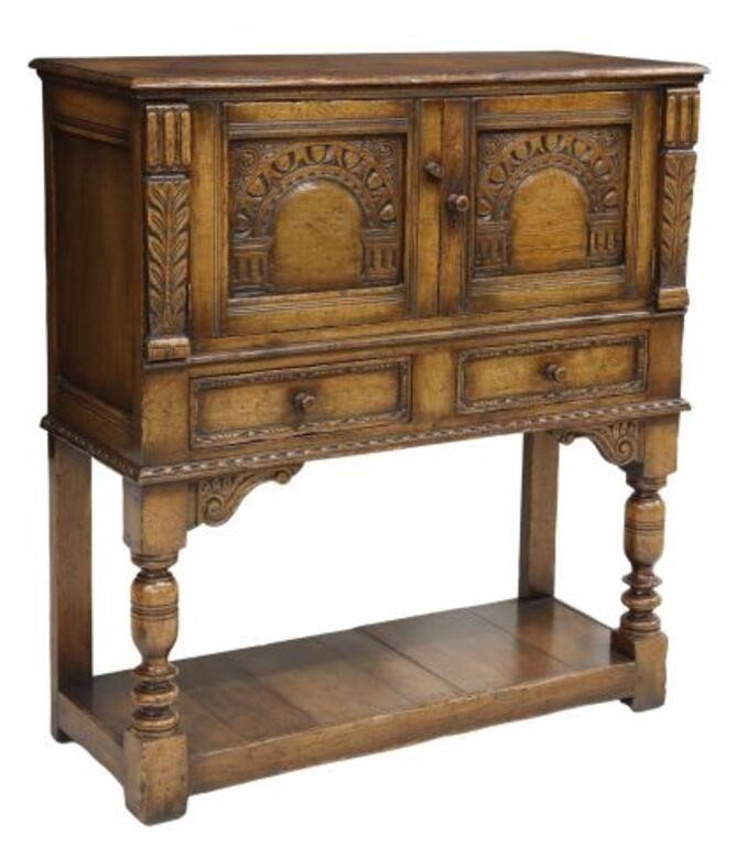 Appraisal: English Jacobean style oak wine cabinet attributed to Titchmarsh Goodwin