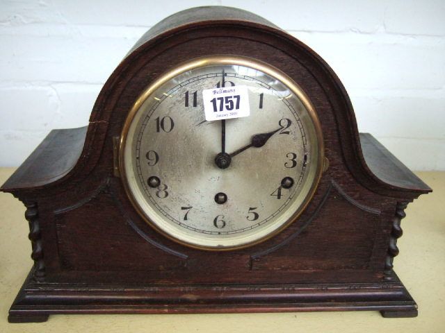 Appraisal: A mid th century oak arch top mantle clock with