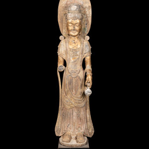 Appraisal: A Chinese Carved Stone Guanyin with Lotus Crown and Remnants