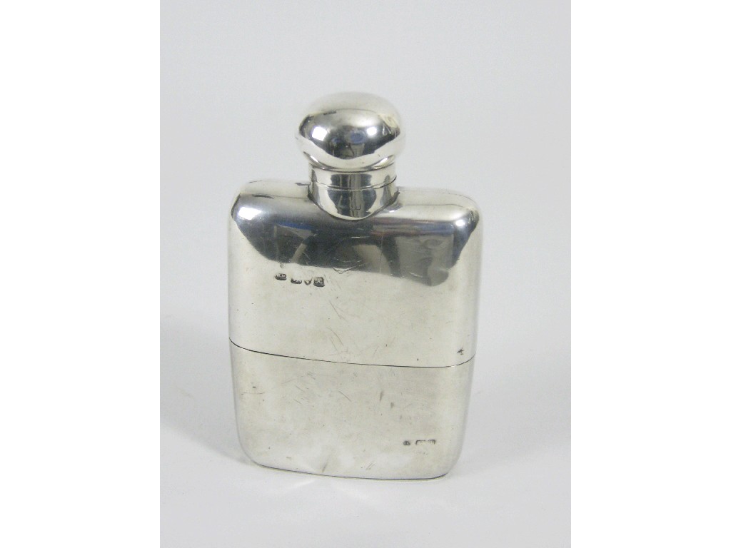 Appraisal: A Victorian Spirit Flask plain with detachable cup and bayonet